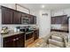 Modern kitchen with stainless steel appliances and granite countertops at 4770 Alford Commons, Cumming, GA 30028