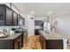 Kitchen with granite countertops, stainless steel appliances, and an island at 4770 Alford Commons, Cumming, GA 30028
