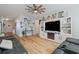 Open living room featuring a fireplace and comfortable seating at 4770 Alford Commons, Cumming, GA 30028