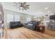 Open concept living room with views into the kitchen and dining area at 4770 Alford Commons, Cumming, GA 30028