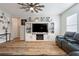 Spacious living room with a built-in entertainment center and hardwood floors at 4770 Alford Commons, Cumming, GA 30028