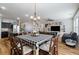 Open-concept room with an adjacent dining area and a comfortable living space at 4770 Alford Commons, Cumming, GA 30028