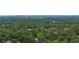 Lush green canopy surrounding the property, with the city skyline in the distance at 907 E Green Ln, Clarkston, GA 30021