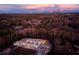 Aerial view of new homes nestled in a wooded area at 907 E Green Ln, Clarkston, GA 30021