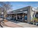 Charming brick building featuring Ford's BBQ, complemented by awnings and a welcoming sidewalk at 907 E Green Ln, Clarkston, GA 30021