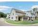 Charming home featuring a well-manicured front yard and an attached garage at 907 E Green Ln, Clarkston, GA 30021