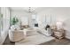 Bright and airy living room with comfortable seating, modern decor, and stylish accents at 907 E Green Ln, Clarkston, GA 30021