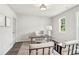 Home office features lots of natural light, modern furnishings, and a comfortable seating area at 907 E Green Ln, Clarkston, GA 30021