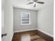 Spacious bedroom with hardwood floors and a ceiling fan at 3563 Bolfair Nw Dr, Atlanta, GA 30331