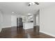 Open concept kitchen with island and hardwood floors at 3563 Bolfair Nw Dr, Atlanta, GA 30331