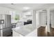Modern kitchen with white cabinets, granite counters, and stainless steel appliances at 3563 Bolfair Nw Dr, Atlanta, GA 30331