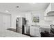 Modern kitchen with white cabinets and stainless steel appliances at 3563 Bolfair Nw Dr, Atlanta, GA 30331