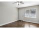 Living room with hardwood floors, neutral walls, and ceiling fan at 3563 Bolfair Nw Dr, Atlanta, GA 30331