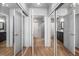 Bathroom with mirrored closets and modern vanity at 950 W Peachtree Nw St # 1005, Atlanta, GA 30309