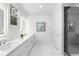 Elegant bathroom with double vanity, large mirror, and walk-in shower at 971 Boulevard # A, Atlanta, GA 30312