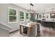 Bright dining area with light wood table and chairs, near kitchen at 3827 Cottage Cir, Tucker, GA 30021