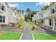 Quaint street view showcasing charming homes, neat landscaping and community gathering spaces at 3827 Cottage Cir, Tucker, GA 30021