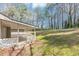 Backyard with a covered patio area, ideal for enjoying the outdoors and entertaining at 7018 Chimney Ridge Dr, Riverdale, GA 30296