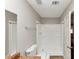 Bright bathroom with shower, toilet, vanity, and mirror offers a clean and functional space at 7018 Chimney Ridge Dr, Riverdale, GA 30296