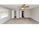 Bedroom featuring neutral paint, bright window, and carpeted floors at 7018 Chimney Ridge Dr, Riverdale, GA 30296