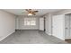 Bedroom with neutral paint, bright window, and ceiling fan at 7018 Chimney Ridge Dr, Riverdale, GA 30296
