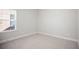 Spacious bedroom with neutral wall paint and carpet at 2471 Arnold Palmer Way, Duluth, GA 30096