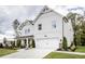 Beautiful two-story home with white siding, a two-car garage, and a well-maintained lawn at 319 Willam Gossett Dr, Canton, GA 30114