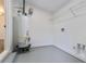 Laundry area with shelving and water heater at 3215 Pennignton Cir, Atlanta, GA 30354