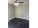 Bedroom with dark hardwood floors and ceiling fan at 346 Tazor St, Atlanta, GA 30314