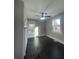 Well-lit bedroom with hardwood floors and ceiling fan at 346 Tazor St, Atlanta, GA 30314