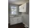 Kitchen with white cabinets and granite countertops at 346 Tazor St, Atlanta, GA 30314