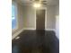Living room with hardwood floors and fireplace at 346 Tazor St, Atlanta, GA 30314