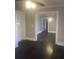 Bright living room with hardwood floors and open floor plan at 346 Tazor St, Atlanta, GA 30314