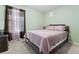 Light and airy bedroom with a queen-size bed and neutral decor at 188 Brandon Ridge Cir, Stockbridge, GA 30281