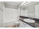Bathroom featuring a shower-tub combination, a vanity with a dark countertop, and tile floors at 6806 Glenridge Dr # E, Atlanta, GA 30328