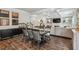 Dining area with black and white chairs and dark wood table at 821 Ethereow Ct, Lawrenceville, GA 30046