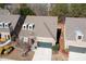 Brick ranch home with a two-car garage, and a nicely landscaped yard at 121 Meridian Dr, Woodstock, GA 30188