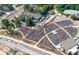 Aerial view of an outdoor amphitheater filled with a crowd; the venue also features a gazebo, fountain, and nearby buildings at 121 Meridian Dr, Woodstock, GA 30188