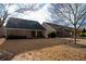 Spacious backyard with view of neighboring homes at 121 Meridian Dr, Woodstock, GA 30188