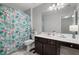 Clean bathroom with a shower/tub combo and dark vanity at 121 Meridian Dr, Woodstock, GA 30188