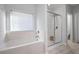 Bathroom with soaking tub and walk-in shower at 121 Meridian Dr, Woodstock, GA 30188