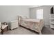 Cozy bedroom featuring a comfortable bed and ample natural light at 121 Meridian Dr, Woodstock, GA 30188