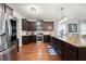 Eat-in kitchen with stainless steel appliances and granite island at 121 Meridian Dr, Woodstock, GA 30188