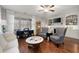 Living room with fireplace and built-in shelving at 121 Meridian Dr, Woodstock, GA 30188