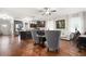 Open concept living area with hardwood floors and kitchen view at 121 Meridian Dr, Woodstock, GA 30188