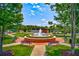 Beautiful town fountain in a landscaped park setting with walking paths and benches at 121 Meridian Dr, Woodstock, GA 30188