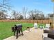 A backyard oasis, perfect for entertaining with a patio, grill, and ample seating at 3 Derrick Ave, Hampton, GA 30228