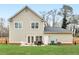 Spacious backyard featuring a patio perfect for entertaining, with a lush lawn at 3 Derrick Ave, Hampton, GA 30228