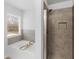 Bathroom showcasing a tub and separate tiled shower at 3 Derrick Ave, Hampton, GA 30228
