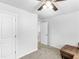 Neutral bedroom with ceiling fan and minimal furniture at 3 Derrick Ave, Hampton, GA 30228